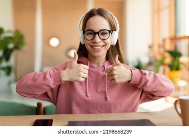 Excited Teen Schoolgirl Having Virtual Remote Class, Participating In Group Online Lesson And Gesturing Thumb Up, Studying At Home By Videocall, Webcam Pov