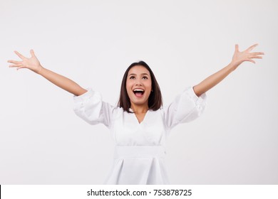 excited woman happy smiling asian girl laughing woman looking up isolated; laughing girl face with happy joyful cheerful successful young woman expression portrait; asian girl young adult woman model