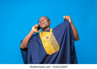 Excited Young African Man Receiving Phone Call