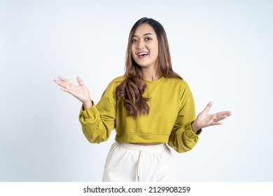 Excited Young Asian Woman Opening Two Palms While Smiling