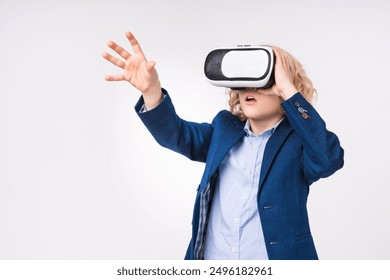 Excited young little small preteen boy male child kid elementary primary middle school pupil teenager in VR-glasses formal wear suit uniform isolated over white background - Powered by Shutterstock