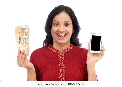 Excited Young Woman Holding Indian Currency And Mobile Phone - Mobile Banking