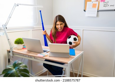 Excited Young Woman Working From Home And Celebrating While Watching A Soccer Game Online