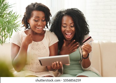 Excited young women found great deal in online store