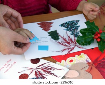Excitement from my own creative work ! -- A little girl learning how to make Christmas card