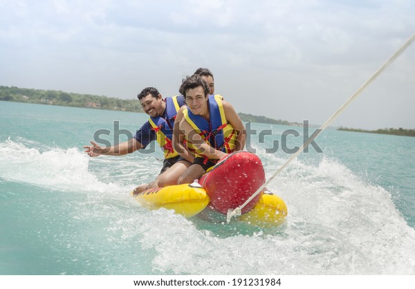 Exciting banana surf ride\
Surfing along the waves can be a real challenge not to fall off to\
the water