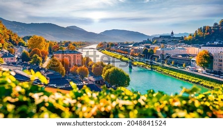 Exciting morning cityscape of Salzburg, Old City, birthplace of famed composer Mozart. Spectacular autumn scene of  Eastern Alps. Splendid outdoor scene of Austria with Salzach river.