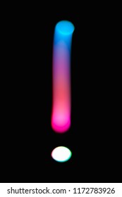 Exclamation Punctuation Mark ! Symbol. Dark Background. Factorial. Logical Negation. Abstract Night Light Painting. Creative Artistic Colorful Bokeh. Design For Book Cover, CD, Party Poster, Post Card