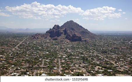 Exclusive living in the area of Camelback Mountain in Phoenix, Arizona as viewed from the air looking east