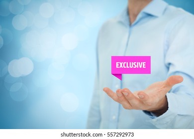 Exclusive offer and exclusivity business model. Businessman hold virtual label with text exclusive. Right composition with bokeh in background. - Shutterstock ID 557292973