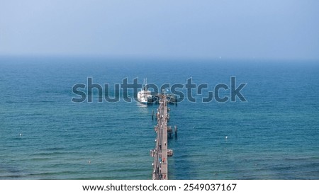 Similar – Image, Stock Photo Graal Müritz pier, Baltic Sea, Germany. View of the sea from the bridge