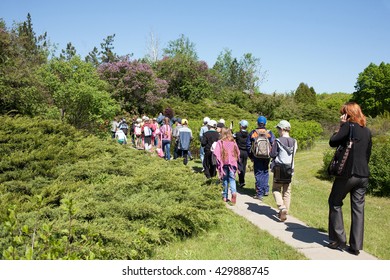 Excursion Children In A Public Botanical Garden In The City Of Krivoy Rog In Ukraine