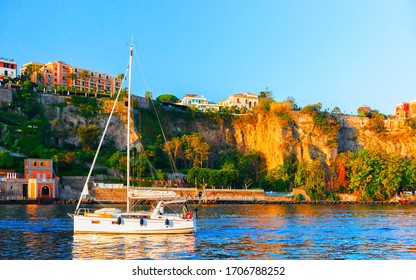 Excursion Cruise Boat And Ship With Tourists In Luxury Marina Grande Port In Sorrento Near Naples On Tyrrhenian Sea, Amalfi Coast, Italy. Italian Summer Paradise. Mountains On Amalfitana Coastline.