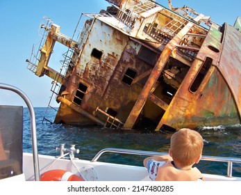 excursion to the old sunken ship. a sunken tanker at sea