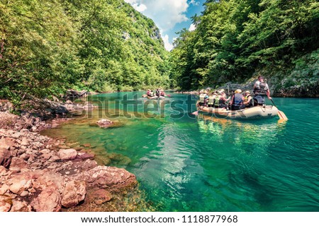 Excursions on inflatable boats along the river Tara. Splendid summer morning in Tara canyon, Montenegro, Europe. Beautiful world of Mediterranean countries. Active tourism concept background.
