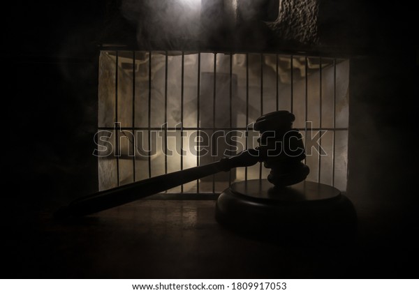 Execution\
with Lethal injection concept. Death penalty lethal injection table\
miniature inside old prison. Old prison bars cell lock. Creative\
artwork decoration. Old grunge prison\
interior.