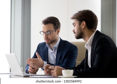 Executive Businessmen Colleagues Working Together Helping In Office Teamwork On Laptop Discuss Online Project, Financial Advisor Insurer Salesman Speaking Consult Client Listen Computer Presentation