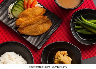 
The Executive Dish Is A Complete Brazilian Meal, In This Case With Breaded Whitefish Filet, Rice, Okra, Cauliflower, Salad And Miso Soup.