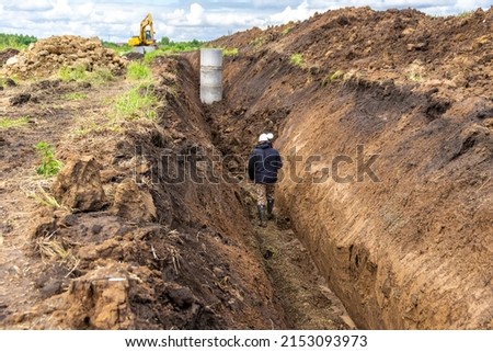 Executive geodetic survey of a sewer or water supply network, geodetic work during the laying of underground utilities, selective focus