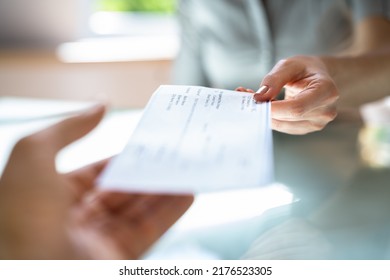 Executive Hand Giving Payment Check Or Compensation Cheque