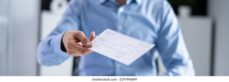 Executive Hand Giving Payment Check Or Compensation Cheque