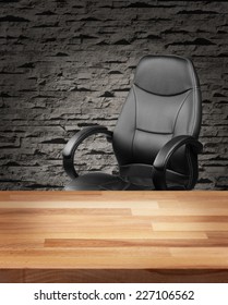 Executive Leather Chair And Wooden Table In Luxury Office Interior