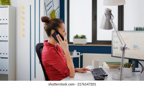 Executive manager using smartphone to call consultant, doing work collaboration on business strategy with statistics charts. Employee talking on phone line to create job development.