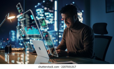 Executive Officer Working on Computer in Office at Night. Augmented Reality Corporate, Financial and Business App Icons Appear From Manager's Laptop. Internet and Online Productivity Concept. - Powered by Shutterstock