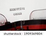 Executive order phrase written with a typewriter.