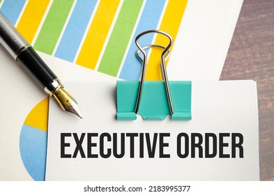 Executive Order Words On Charts And Pen