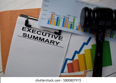 Executive Summary Text Write On A Paperwork And Gavel Isolated On Office Desk.