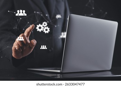 Executive uses advanced digital tools on virtual screen to illustrate goal focused leadership, operational efficiency and the role of smart systems in shaping organizational success