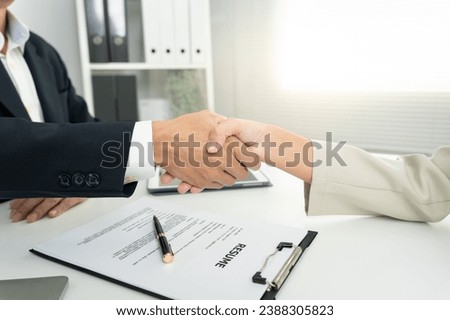 Executives accept job application documents and read job applicants resume to match the position. company publishes vacancies online to find human. Human resource, interview, letters, competence.