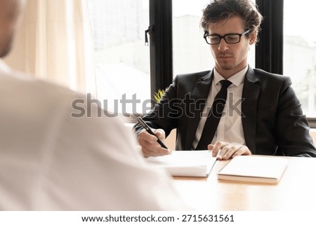 Executives accept job application documents and read job applicants resume to match the position. company publishes vacancies online to find human. Human resource, interview, letters, competence.