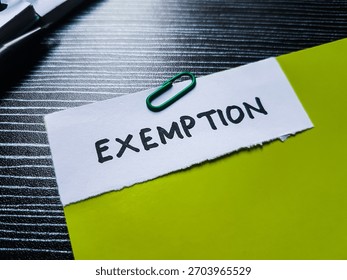 Exemption writting on table background.
