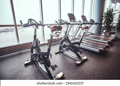 Exercise bikes and treadmills in the fitness center. Sport, fitness, health.