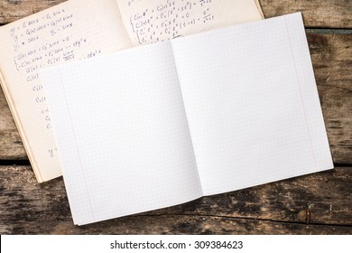 Exercise Book With Work Book On Old Table. Top View Image