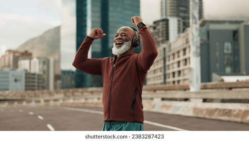 Exercise, celebration and senior man, headphones, city and achievement with workout, streaming music and radio. African person, pensioner and runner with headset, progress and fitness wellness or joy - Powered by Shutterstock