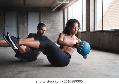 Exercise, couple and fitness with medicine ball outdoor for workout, balance training and core strength of performance. Active, people and muscle challenge, strong biceps and support for gym results - Powered by Shutterstock