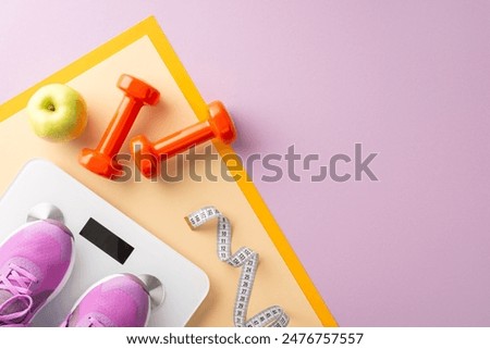 Exercise equipment layout. Top view of female trainers, hand weights, exercise mat, measuring tape, weighing scale, and an apple for energy on pastel purple background with space for text or advert