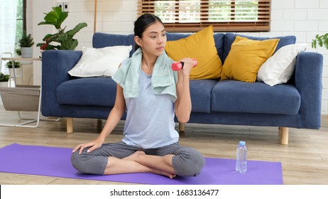 Exercise At Home, Asian Girl Holding Dumbbell For Workout Fitness, Healthy Asia Woman Training Weight Fit Sport For Body Strength, Female Exercising In Home Living Room, People Wellness, Well Being