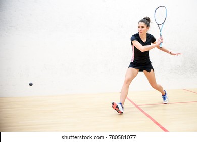 Exercise on the backhand in squash, girl athlete - Shutterstock ID 780581077