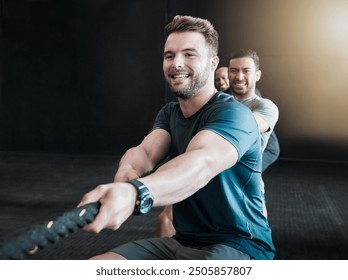 Exercise, pull and rope with people in gym together for tug of war fitness challenge or game. Power, strength and teamwork with friends in health club for physical competition, training or workout - Powered by Shutterstock