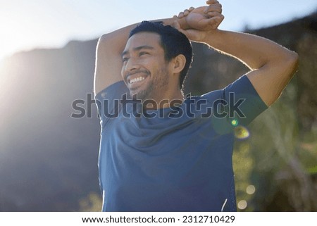 Exercise, thinking and stretching with a man runner outdoor in the mountains for a cardio or endurance workout. Fitness, sports and idea with a young male athlete getting ready for a run in nature