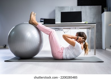 Exercise Workout With Fitness Ball At Office Desk