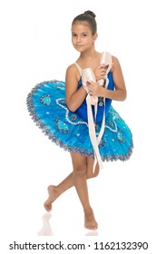 Exercises to develop pointe shoes dance skill. Child happy holds ballet shoes important attribute excellent ballerina. Girl ballerina holds pointe shoes in hand white background. Professional advice.