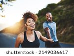 Exercising will only make you feel better. Cropped shot of a happy young couple out for a run together.