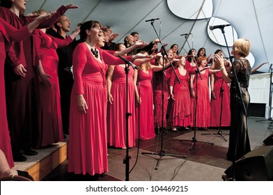 EXETER -  JUNE 2: Glorious Chorus Choir Performing Live On The Global Community Stage At The Exeter Respect Festival 2012 On June 2, 2012 In Exeter, UK