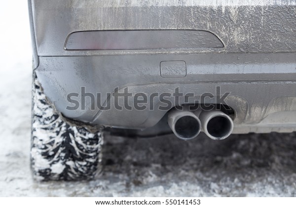 exhaust pipe car smoke winter\
snow