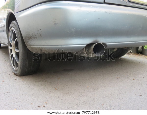Exhaust pipe (Muffler and tailpipe on a car), used\
to guide reaction exhaust gases away from a controlled combustion\
inside an engine, the entire system conveys burnt gases from the\
engine